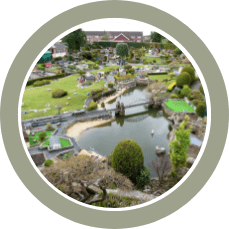 overview of bekonscot model village featuring a river and detailed models