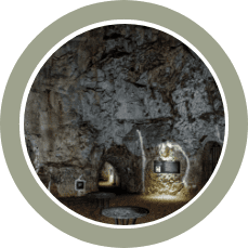 interior of cave with table and some atmospheric lighting