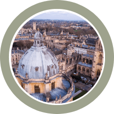 Aerial view of Oxford with domed rooftops and historic buildings.