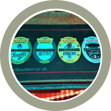 bar mat featuring four different Rebellion Brewery beers